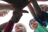 Team work for kids in soccer class.